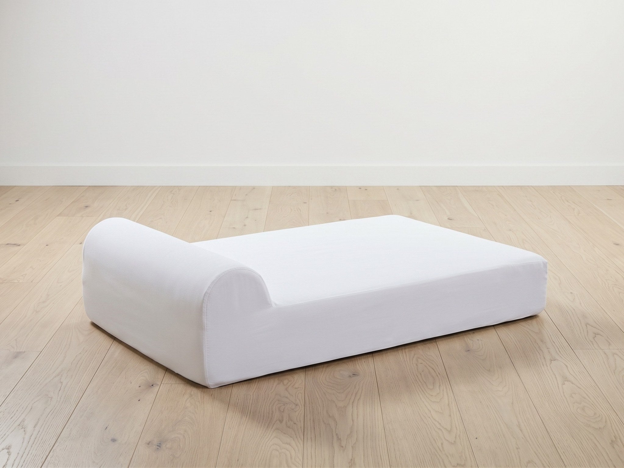Illustration of the connected foam-and-bolster insert outside its cover.