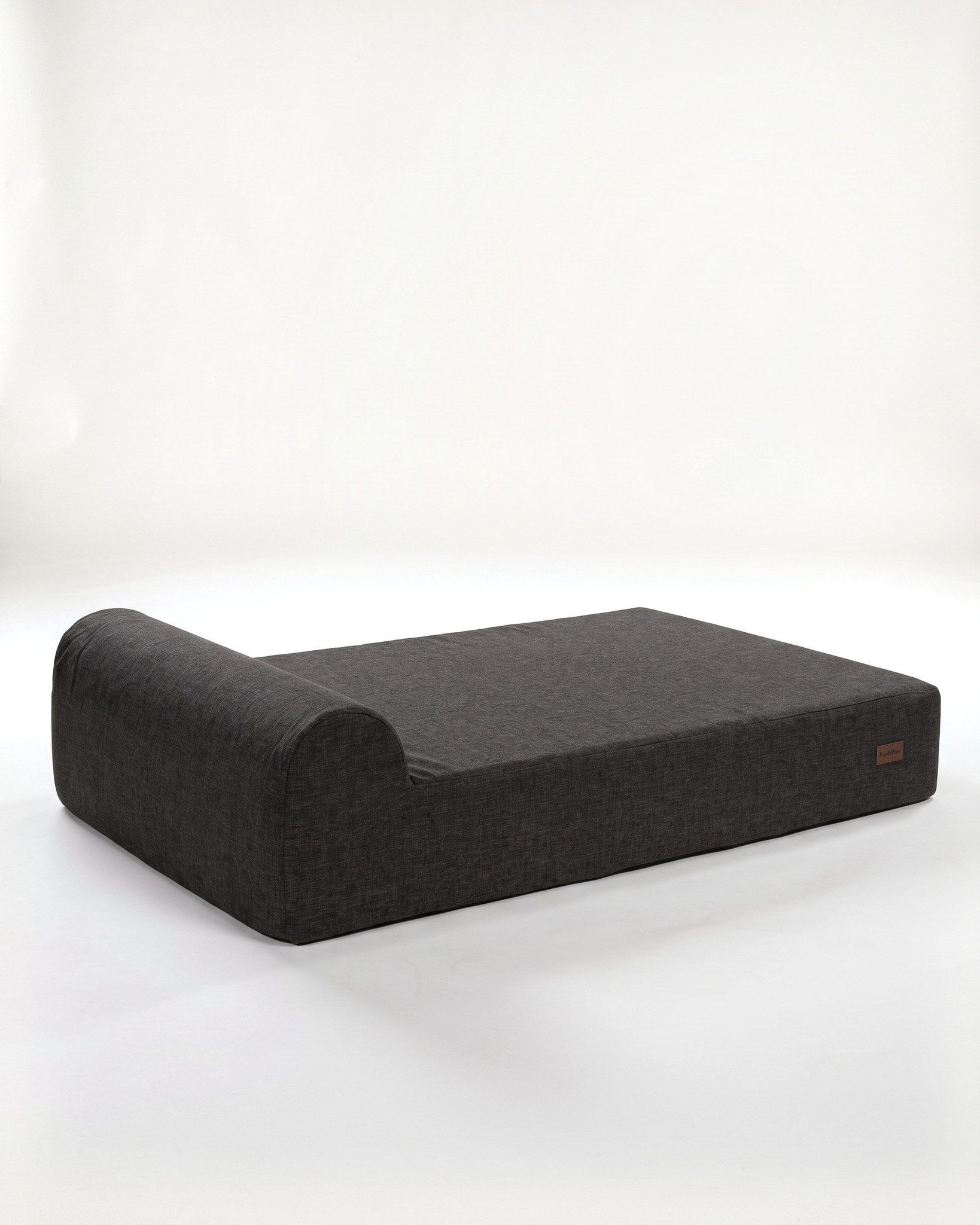 Charcoal woven cover fitted on an EachPaw bed.